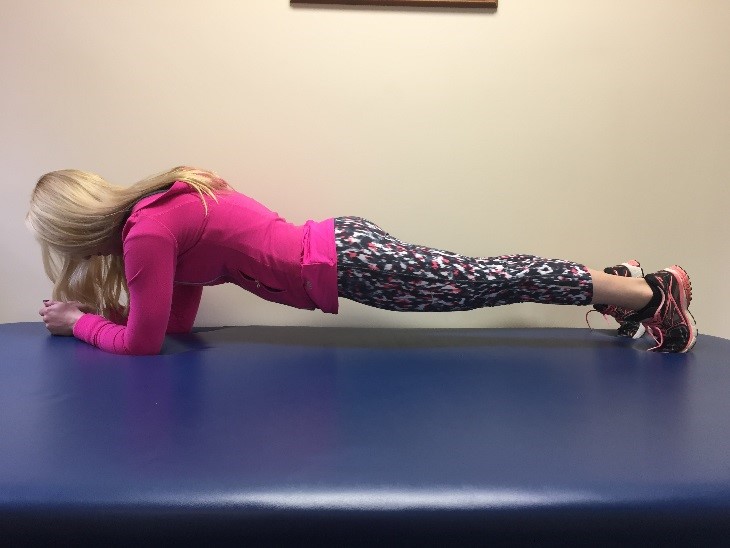 Patient performing plank exercise